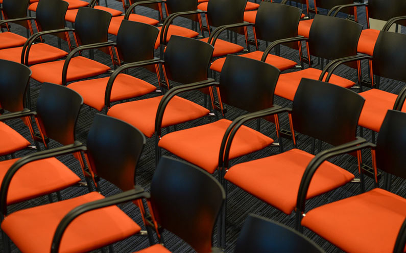 Orange empty chairs